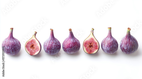 Group of whole and half cut ripe purple fig fruits isolated on white background. sweet vegetarian vegan dessert, fresh raw organic healthy nutrition, tasty vitamin antioxidant piece. photo