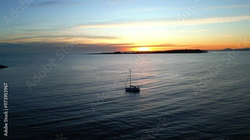 Sunset Serenity: Relaxing Aerial View of a Tropical Coastline with Sailing Boats