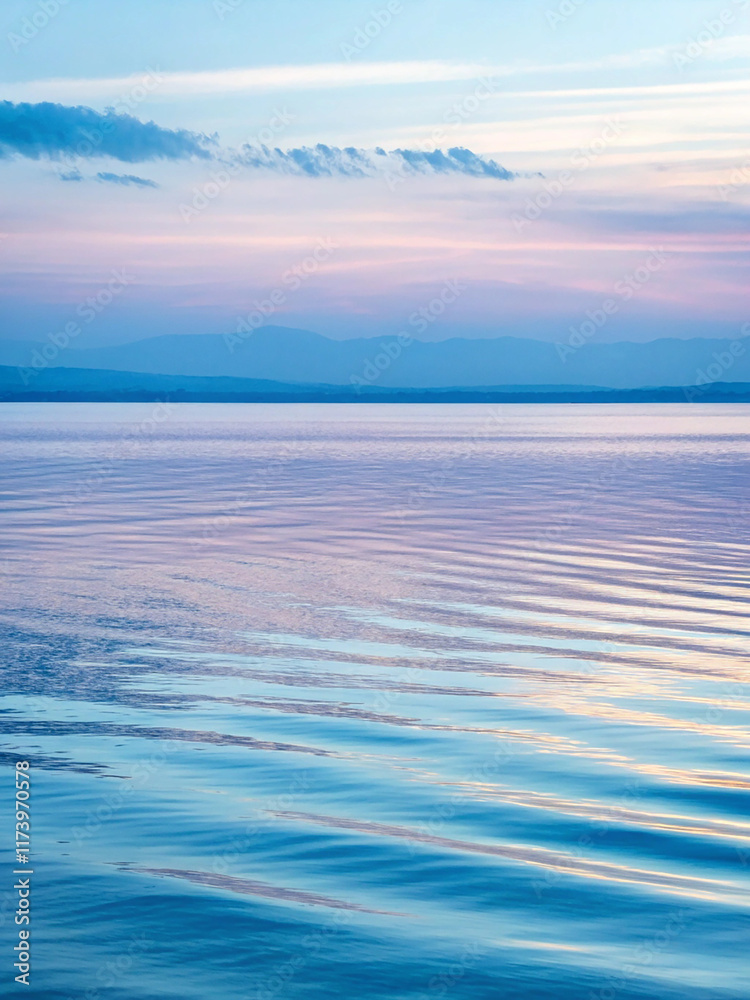 Fototapeta premium A tranquil abstract background with soft, wavy patterns in shades of sky blue and periwinkle,