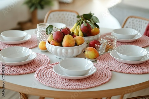 Bright dining table adorned with colorful fruits and elegant dis photo