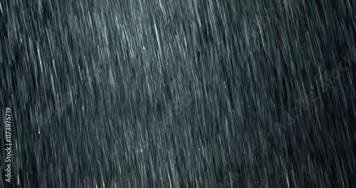 4K high-speed angled heavy rainstorm on a black surface, dynamic splashing of raindrops. High-end rain closeup VFX insert, a powerful weather element, showcasing the intense realism of the rain. 
