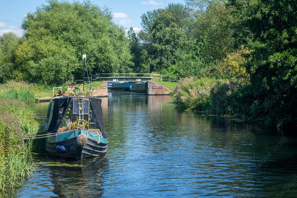 Fototapeta premium Boat moored along the river Stort in Hertfordshire
