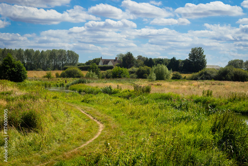 A home barely visible along the river Stort