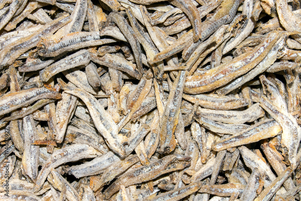 Dried and salted anchovies for beer.Anchovies background.Dried fish.Appetizer for beer. Dried and salted anchovies for beer.Anchovies background.Dried fish.Appetizer for beer.