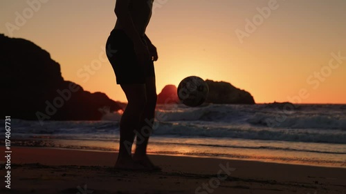 Golden Goals: Silhouetted Young Man Playing Soccer on a California Beach at Sunset
