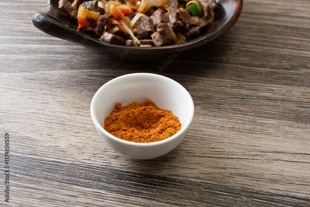 A view of a bowl of shiro powder. A view of a bowl of shiro powder.