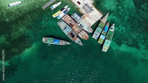 Wooden boat moves slowly, ready to dock at the harbor.