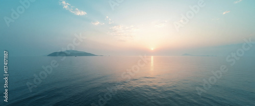 Wallpaper Mural Endless Oceans at Dusk with Gentle Waves and Silhouetted Islands in the Distance Torontodigital.ca