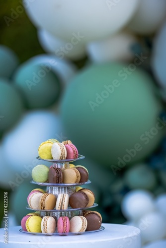 Beautiful macaron cake patisserie multi tier stand full of multi color macarons all flavors and assorted colors real wedding with flowers and roses pink strawberry in Gender Reveal Party