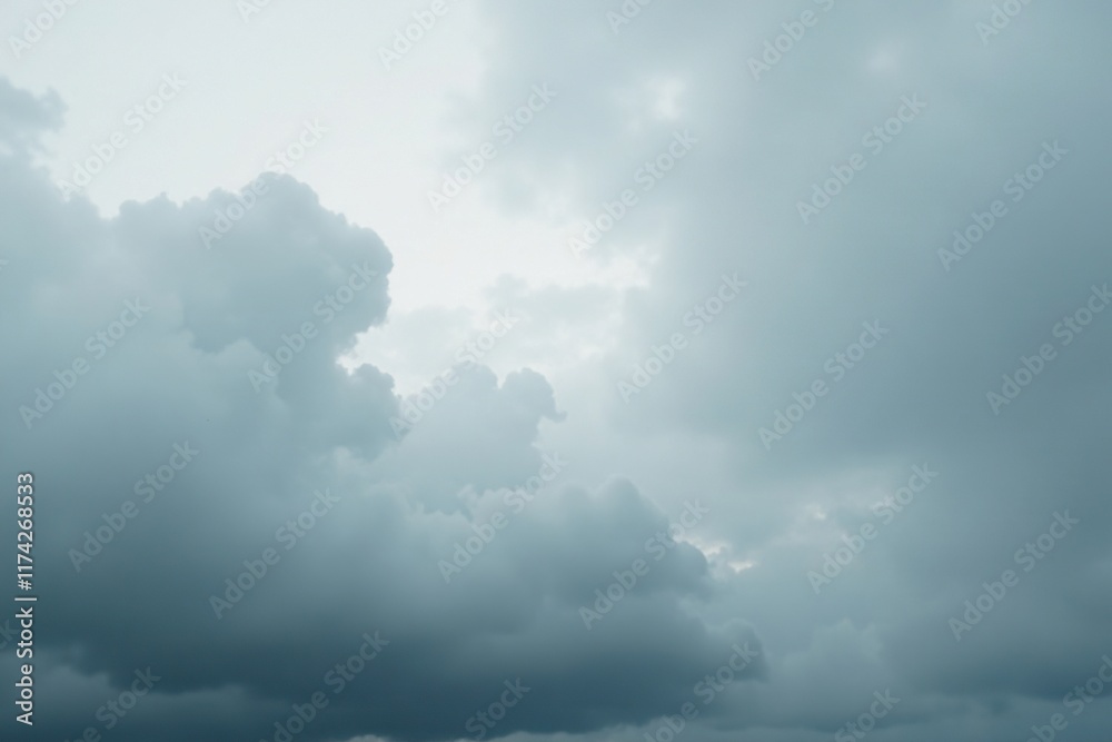 Overcast sky with soft white fog and wispy clouds, distinct grey tone,
