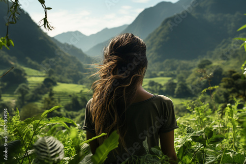 Exalts ethereal splendor of a valley, unveiling undulating eminences, verdant flora, and serene ambiance that characterizes these humble terrains photo