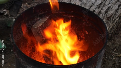 Vibrant Flames Erupting from a Barrel Examining Fire Dynamics and Power