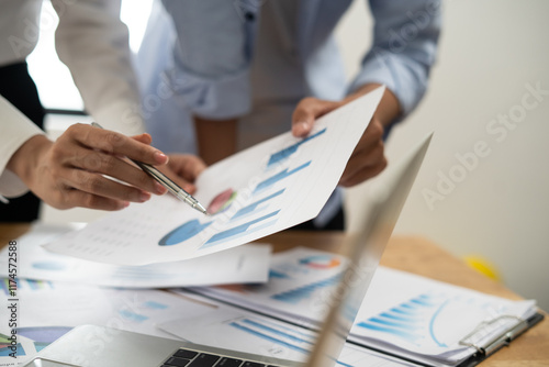 Business accountant working audit inspect calculating expense annual financial report balance sheet statement, doing finance making notes checking document and data analysis profit graph