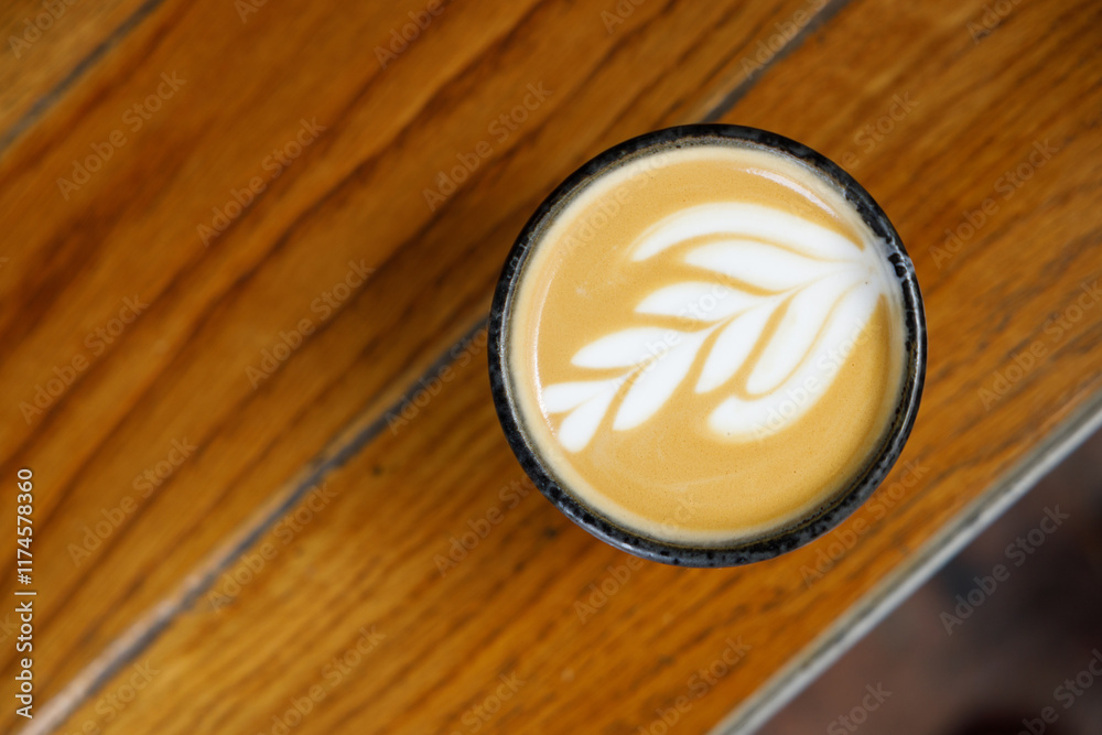 Cup of hot latte coffee by the street Cup of hot latte coffee by the street