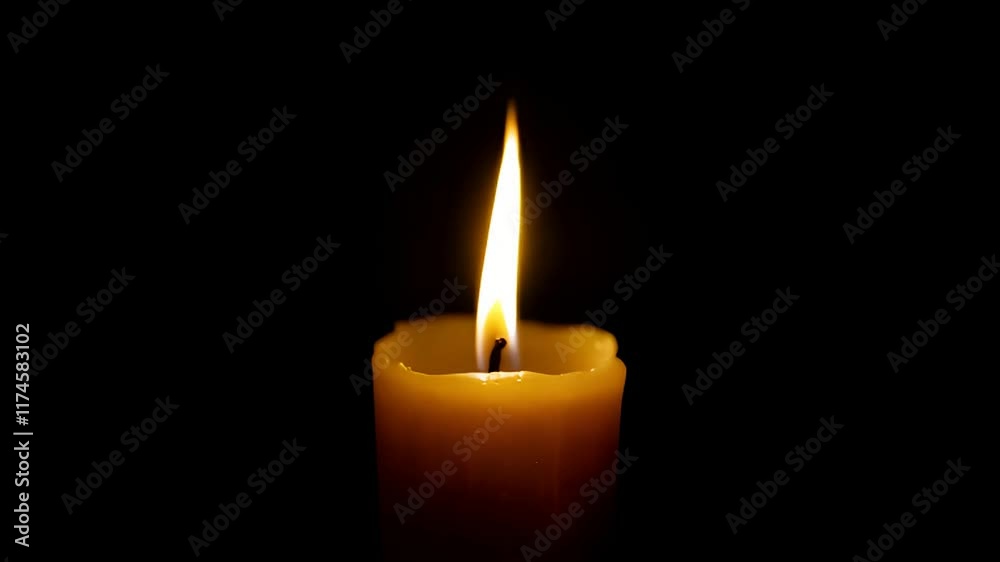 Single candle burning brightly in dark room, black background, memorial, hope. Single candle burning brightly in dark room, black background, memorial, hope.