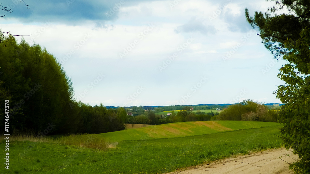 Rural road through Kashubian fields. Rural road through Kashubian fields.