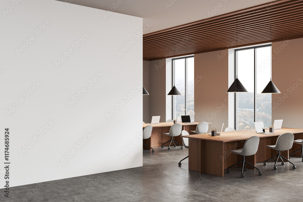 Empty white wall mockup inside a modern office space with natural light and wooden furniture. 3D Rendering Empty white wall mockup inside a modern office space with natural light and wooden furniture. 3D Rendering