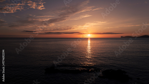 Sunset in the sea in orange tones, Sardinia