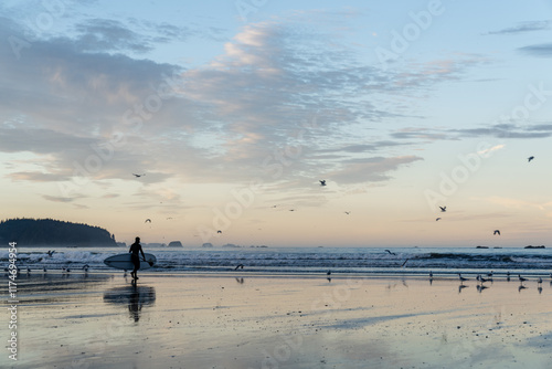 Surfer at Hobuck Beach in the Olympic Peninsula on the far northwest corner of Washington