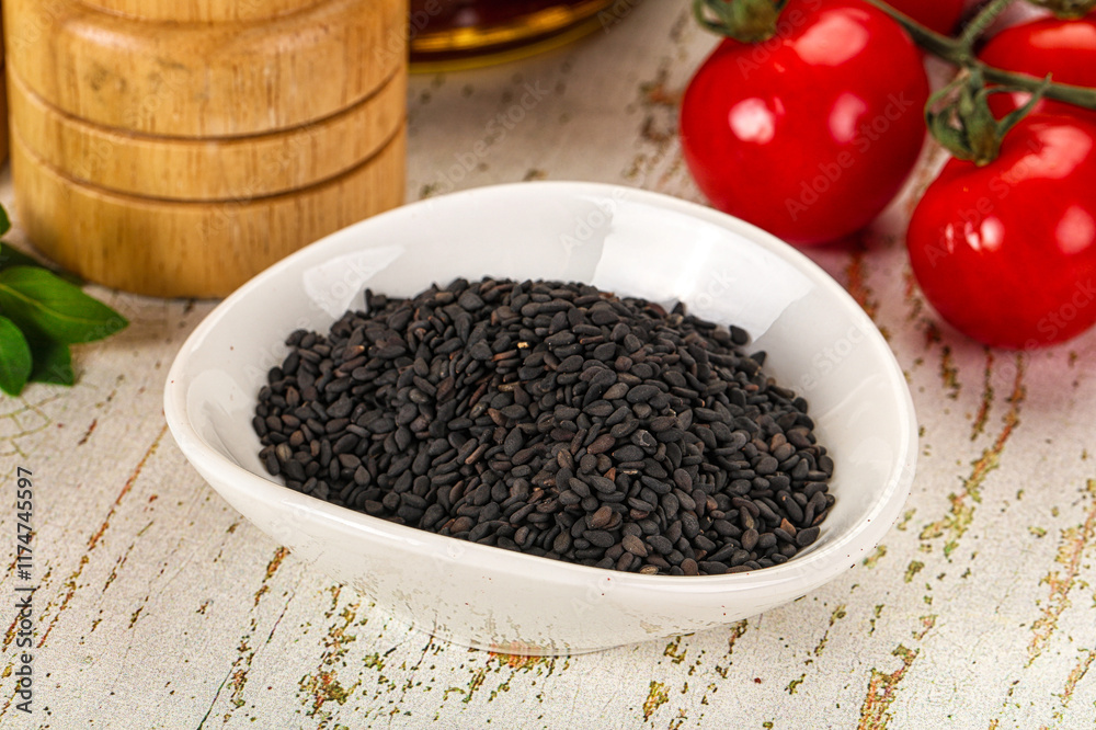 Black sesame seeds in the bowl Black sesame seeds in the bowl