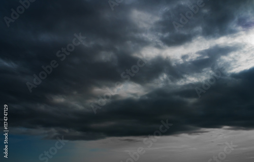 Fototapeta Naklejka Na Ścianę i Meble -  Cloud storm sky dark halloween background rain lightning thunder stoumy typhoon Nature light scene rainy atmosphere damage effect carbon dioxide dust air pollution 2.5 Pm, texture nature windstorm.