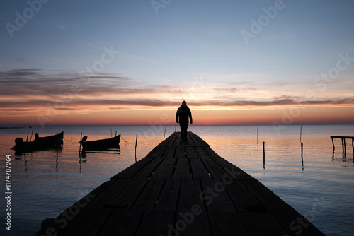 Winter morning on the Razim saltwater lake in the traditional fishing village of Sarichioi, one of the largest lakes in Romania, part of the Danube Delta Biosphere Reserve, Tulcea County, Romania
