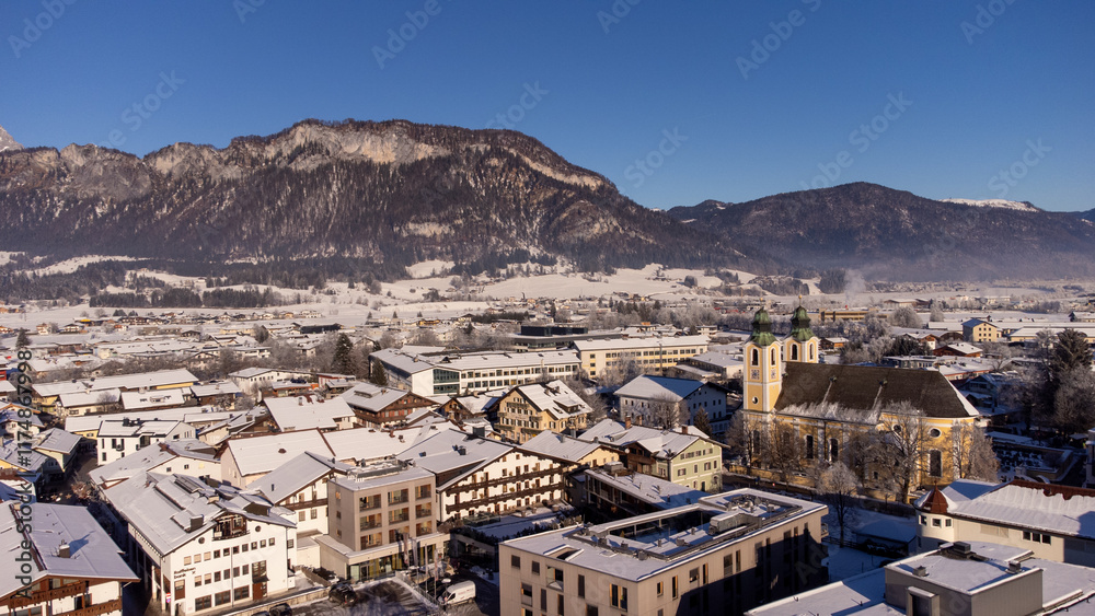 View of the the town Saint Johann with church at Wilder Kaiser in Austria Tyrol European Alps