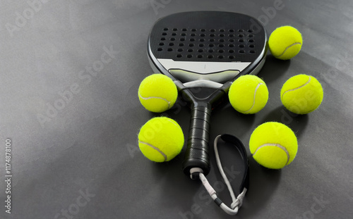 Padel tennis racket sport court and balls. Download a high quality photo with paddle for the design of a sports app or soical media advertisement photo