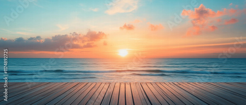 Fototapeta Naklejka Na Ścianę i Meble -  Serene beachfront deck at sunset with calm ocean waves and vibrant sky colors