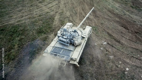 drone view - heavy tank at full speed off-road