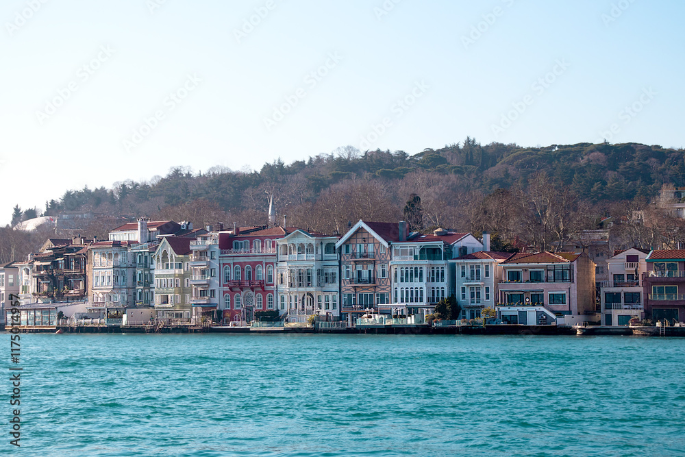 Panaromic view of colorful famous Yeniköy mansions. Historical mansions on the shores of the Bosphorus. Touristic architectural buildings. Panaromic view of colorful famous Yeniköy mansions. Historical mansions on the shores of the Bosphorus. Touristic architectural buildings.