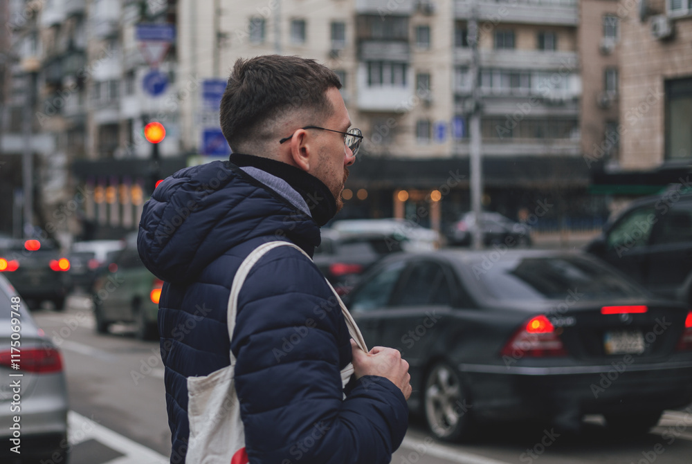 Naklejka premium A man walks around the city