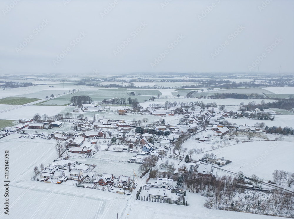 Obraz premium Berenbrock Kreis Soest city Airplane view while snowing in deep winter. snow landscape in 59597