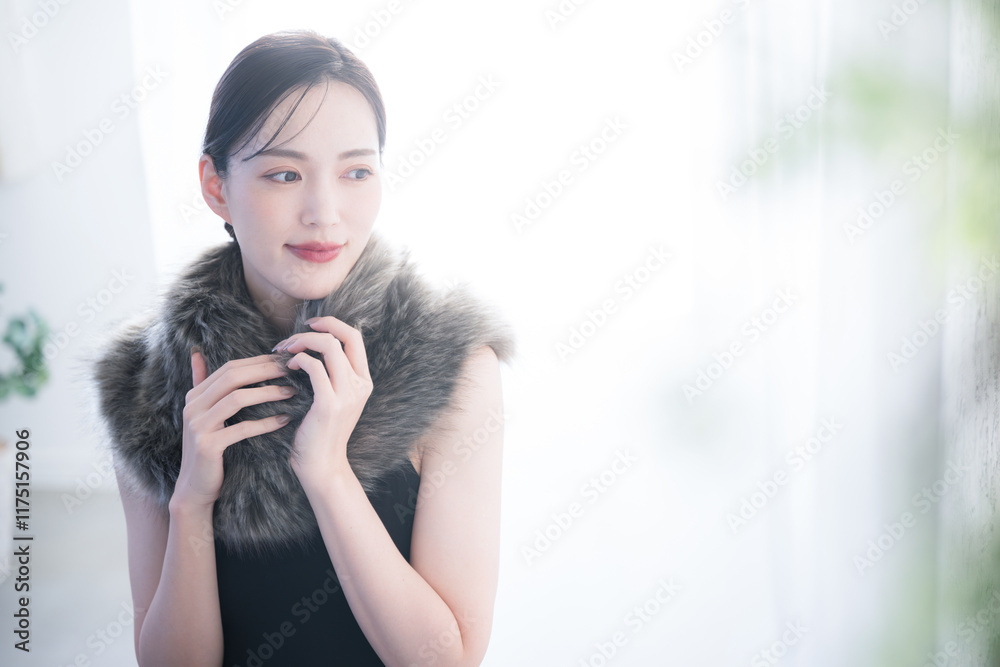 茶色のファーを付けた美しい美容の冬のビューティーイメージ 白バック 茶色のファーを付けた美しい美容の冬のビューティーイメージ 白バック