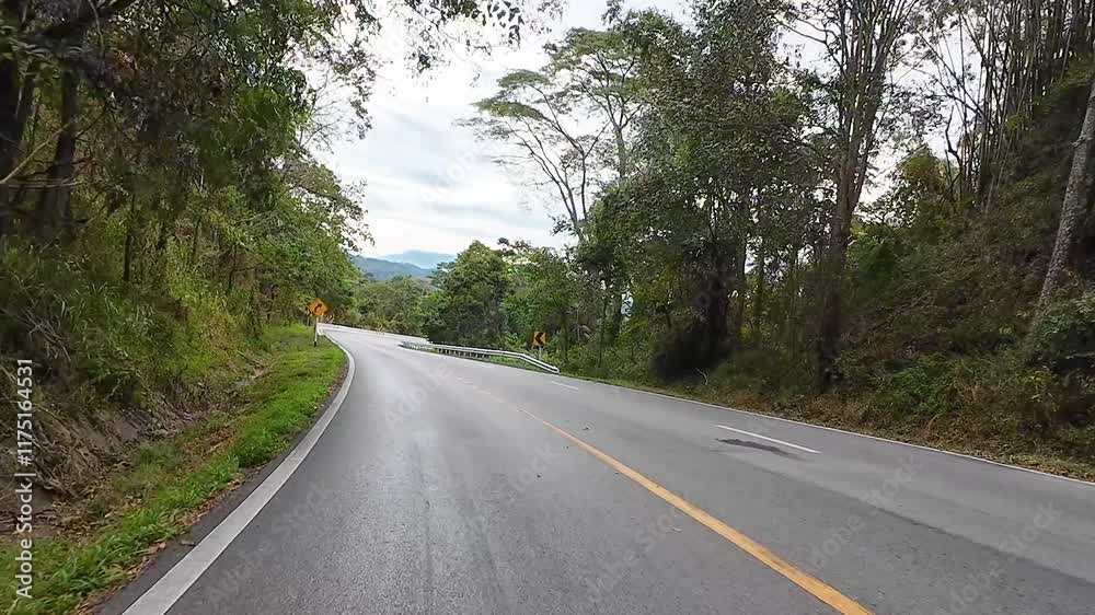 Driving car on the road in mountain and nature forest environment in Thailand. Transportation scenic drive POV 4k footage. Driving car on the road in mountain and nature forest environment in Thailand. Transportation scenic drive POV 4k footage.