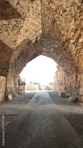 Walking through the historic Belvoir Fortress in Israel’s nature reserve on a cloudy winter day. Ancient stone ruins and wide-lens views of heritage and landscape. insrael