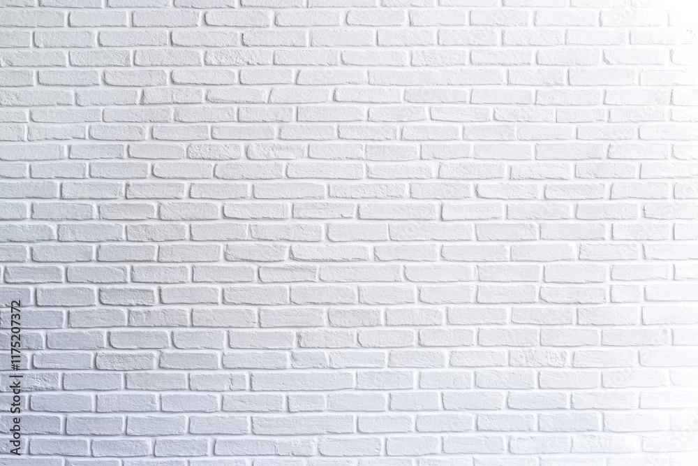 Obraz premium A clean, white brick wall background ideal for various design and advertising projects.