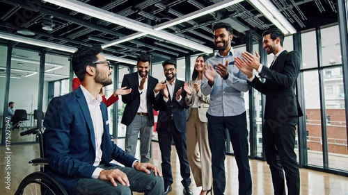 Office Members Applaud Disabled Employee