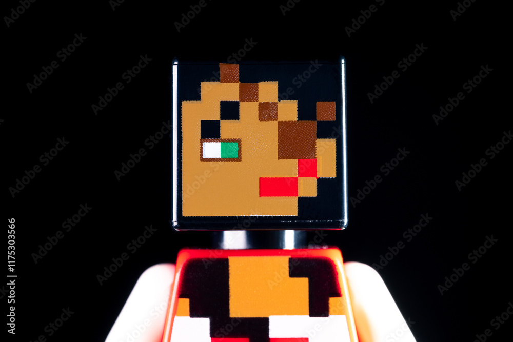 Fototapeta premium Face closeup of LEGO Minecraft Woman pirate on the black background