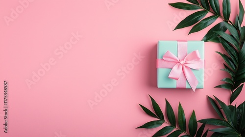 Valentine's Day Pastel Gift Box with Pink Bow and Tropical Leaves on Pink Background