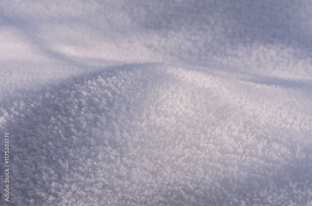 a snow hummock covered with crystallized snow with shadows a snow hummock covered with crystallized snow with shadows