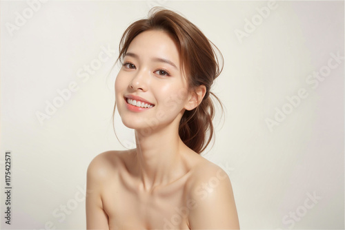 A woman with a beautiful smile and a ponytail