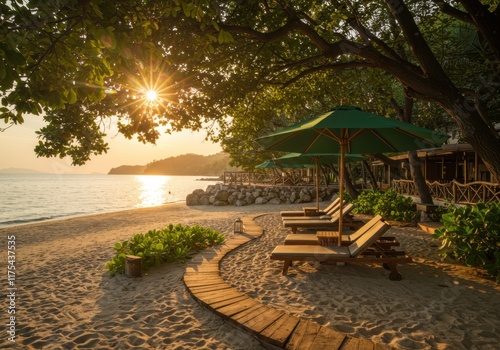 Tropical beach paradise, golden sunset, sunburst through trees, green beach umbrellas, wooden loungers, curved stone pathway, lush vegetation, tranquil seaside, serene atmosphere, warm sunlight, idyll