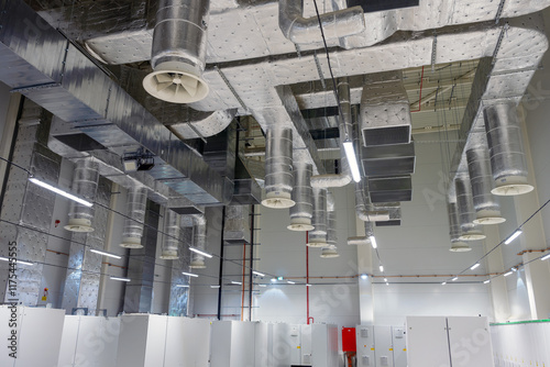 Interior ventilation ducting and fans in medium voltage room
