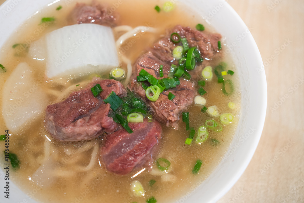 Traditional Taiwanese beef noodle soup in bowl Traditional Taiwanese beef noodle soup in bowl
