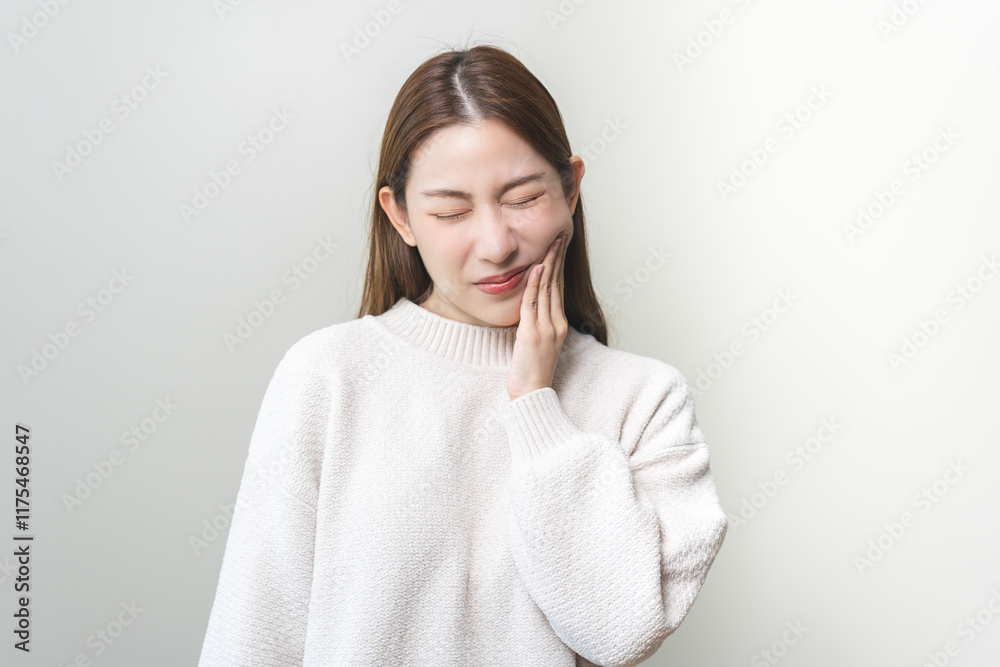 Face expression suffering from sensitive teeth and cold, asian young woman, girl feeling hurt, pain touching cheek, mouth with hand. Toothache molar tooth, dental problem isolated on white background. Face expression suffering from sensitive teeth and cold, asian young woman, girl feeling hurt, pain touching cheek, mouth with hand. Toothache molar tooth, dental problem isolated on white background.