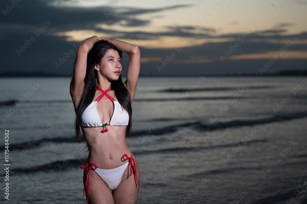 Portrait woman in bikini on the beach with Sunset Portrait woman in bikini on the beach with Sunset