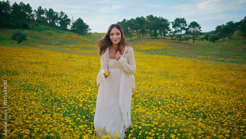 Country woman enjoy flowers plantation gloomy summer day. Girl taking bloom Country woman enjoy flowers plantation gloomy summer day. Girl taking bloom