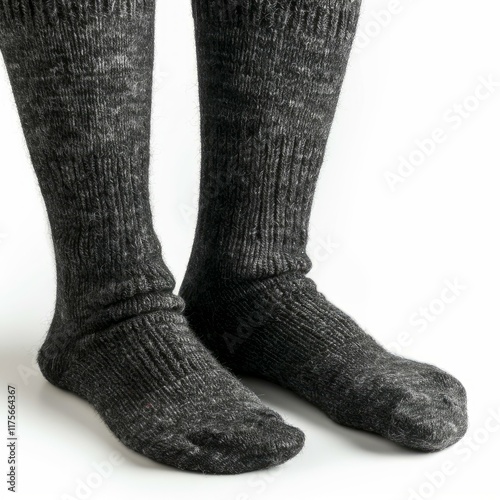 Wallpaper Mural Knitted woolen socks standing upright on a white background, showcasing warmth and comfort Torontodigital.ca