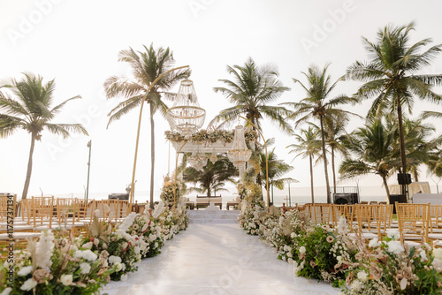 Photography A romantic white beach wedding celebration with an outdoor ceremony, featuring e